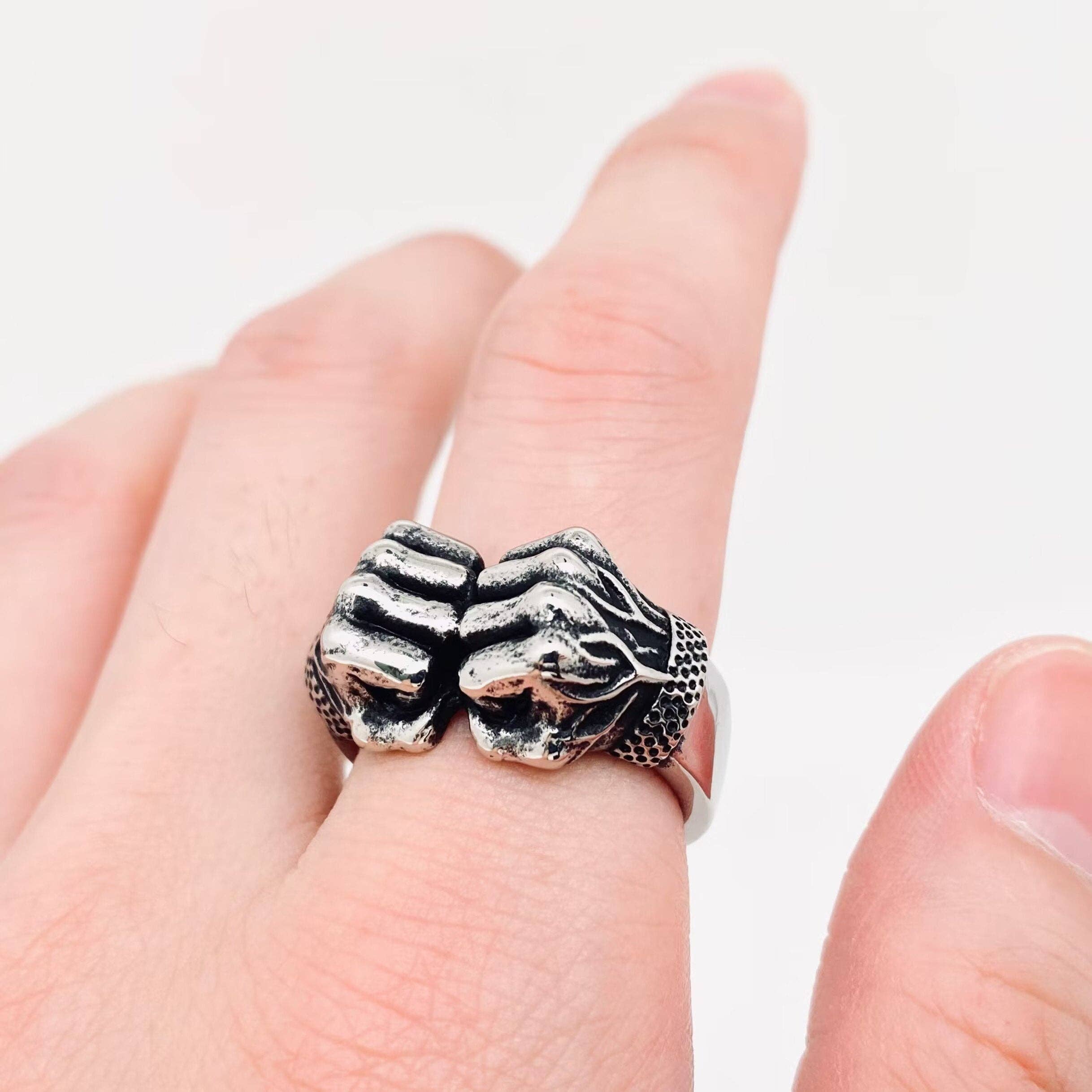 mens ring on hand