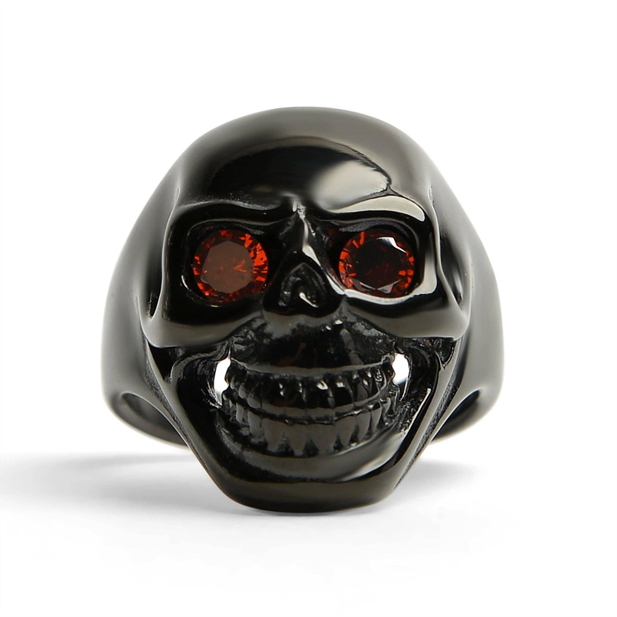 unisex black skull ring red gem eyes bold biker ring perfect gift for him or her durable high quality black plated fast free shipping stainless steel red cz eyed black skull ring top notch stainless steel enduring fiery red cubic zirconia eyes posh dark finish daring edgy vibe polished sterling silver silky smooth comfy to wear unique biker jewelry alternative fashion statement gothic punk rocker ring mens womens
