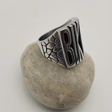 flip off middle finger ring stainless steel statement piece bold and enduring rebellious spirit rugged durability edgy style bikers motorcycle riders rock punk goth fashion big chunky ring eye-catching design substantial jewelry provocative touch unisex appeal versatile jewelry collection withstands test of time resilient and striking individuality strength leather jacket rock band t-shirt goth-inspired attire unique style concert open road everyday statement accessory handcrafted