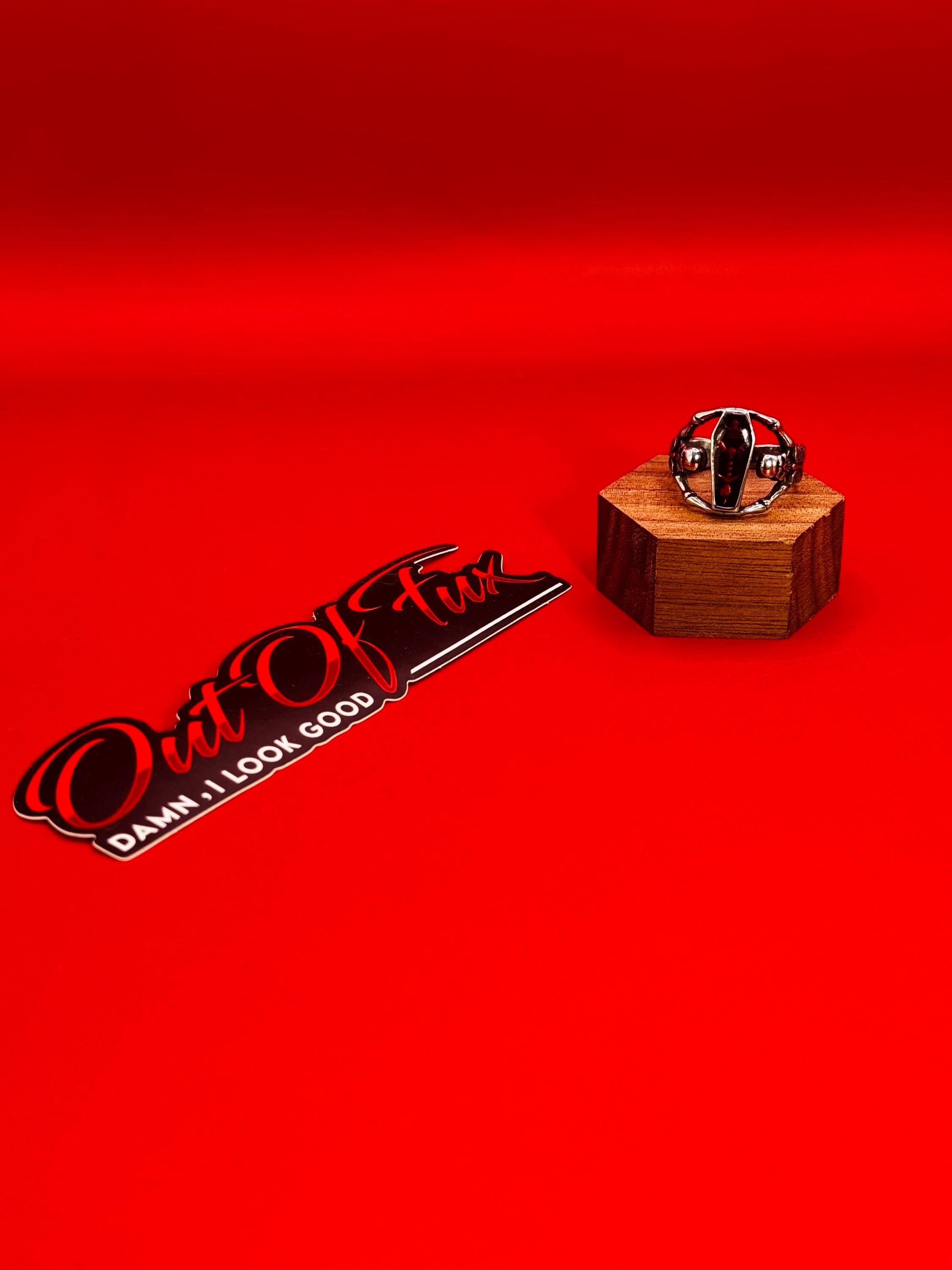 Bold Coffin Skeleton Stainless Steel Ring with Red Stone - Perfect for Bikers and Motorcycle Enthusiasts
