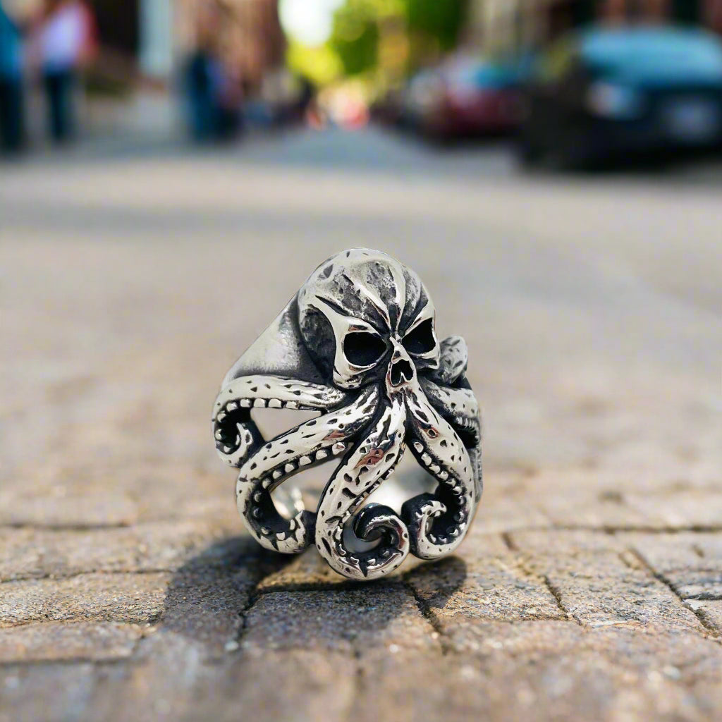 mens octopus ring on sidewalk