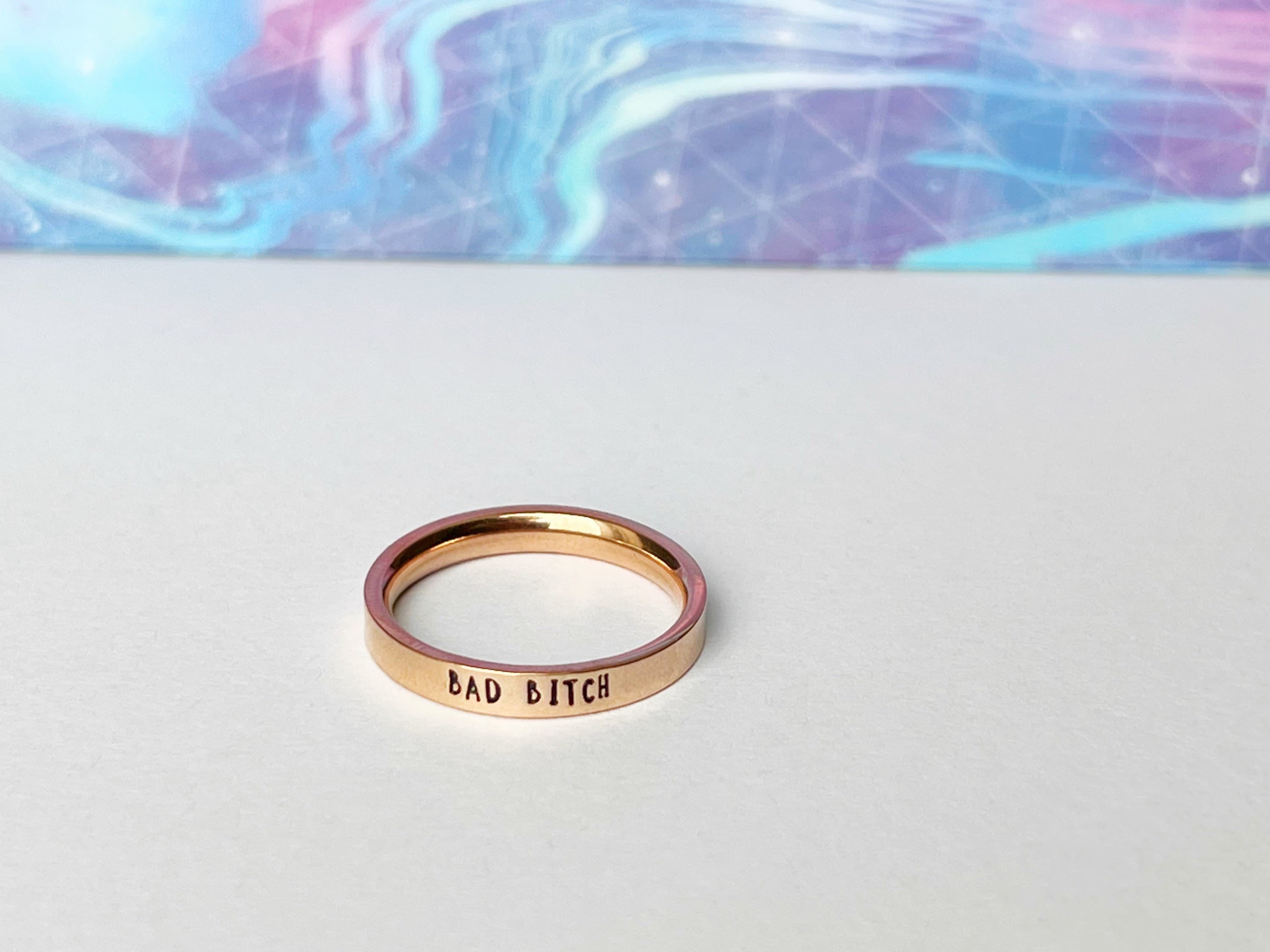 bad bitch ring with colorful background