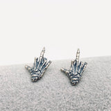 sterling silver skeleton skull hand stud earrings hypoallergenic fuck you flipping off funny sassy profanity high quality free shipping playful unique traditional jewelry intricate detailing edgy skull bones bold touch make a statement individuality hypoallergenic sterling silver high quality handmade punk gothic jewelry rebellious accessories alternative fashion statement earrings bold jewelry unique earrings sterling silver earrings sassy stud earrings bold statement jewelry