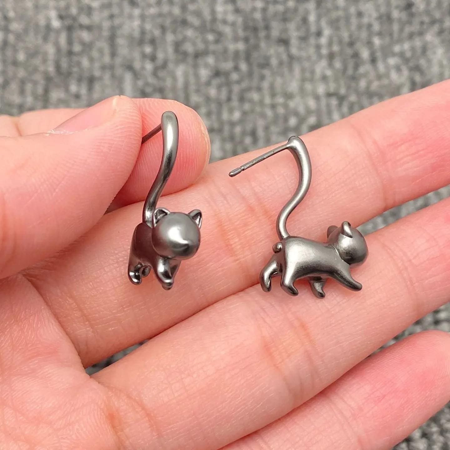 Modern Fashion Earrings Cat Design Silver Plated Metal Heart Detail Accent Wrap Tail Style Unique Animal Jewelry Biker Fashion Statement Nickel-Free Construction Hypoallergenic Material Beautiful Women Accessory Perfect Gift Choice